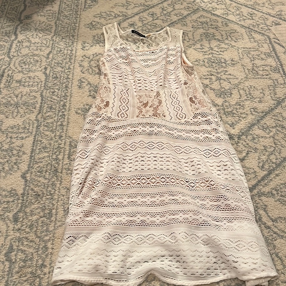 White lace mini dress with nude slip